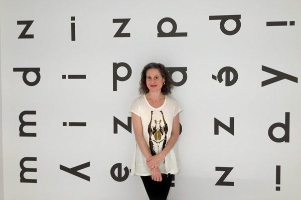 woman on artistic lettered background